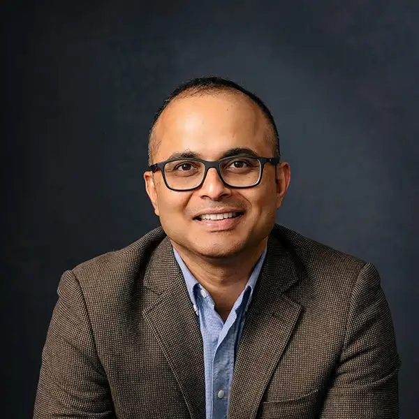 Dr Ajay John